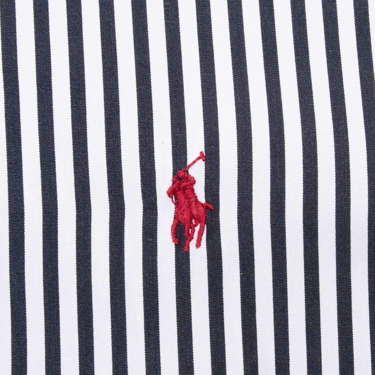 Red Ralph Lauren Polo player embroidery on black and white striped fabric