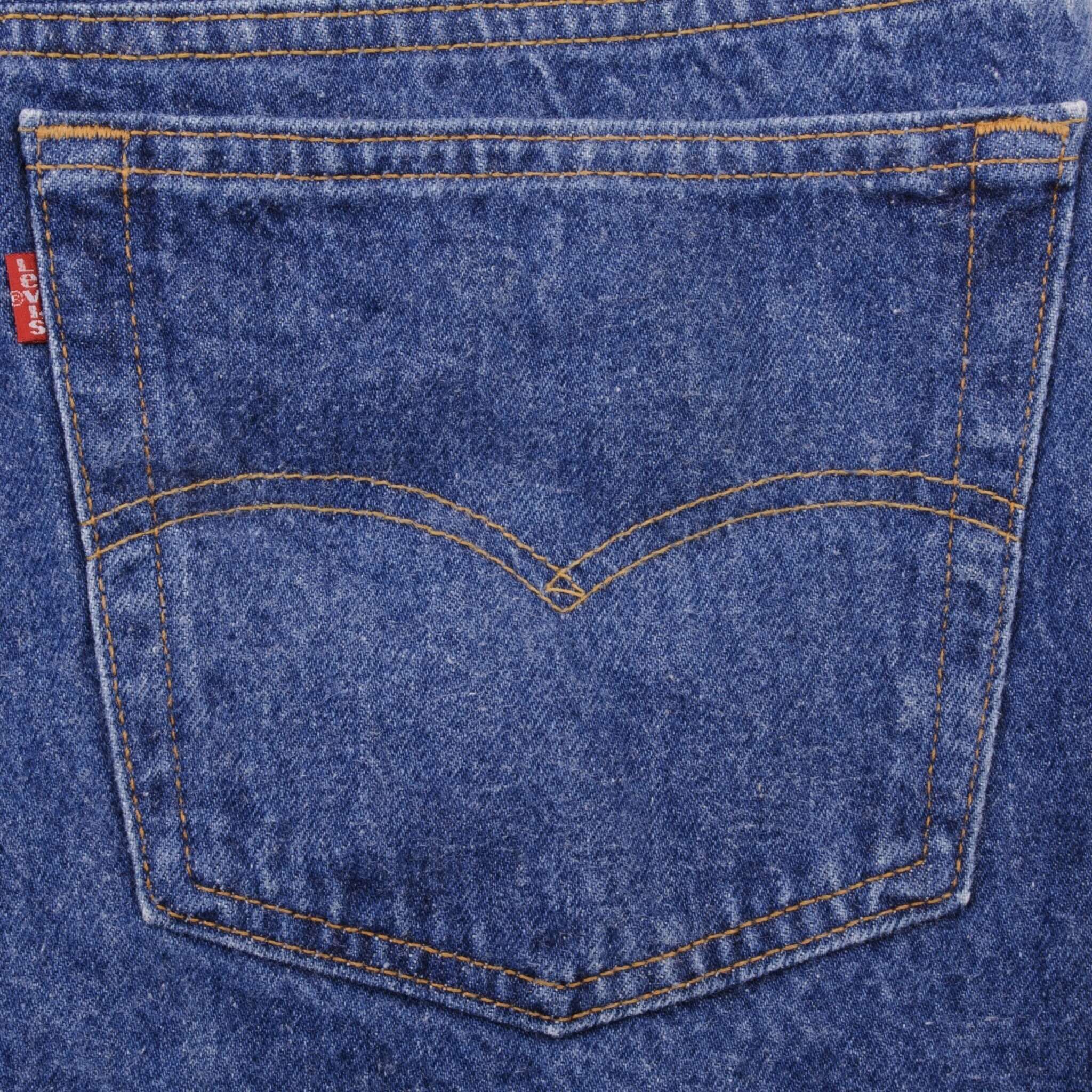 Beautiful Indigo Levis 501 Jeans 1990s Made in USA with Medium Dark Wash Size on tag 46X30 Actual Size 43X29 Back Button #552