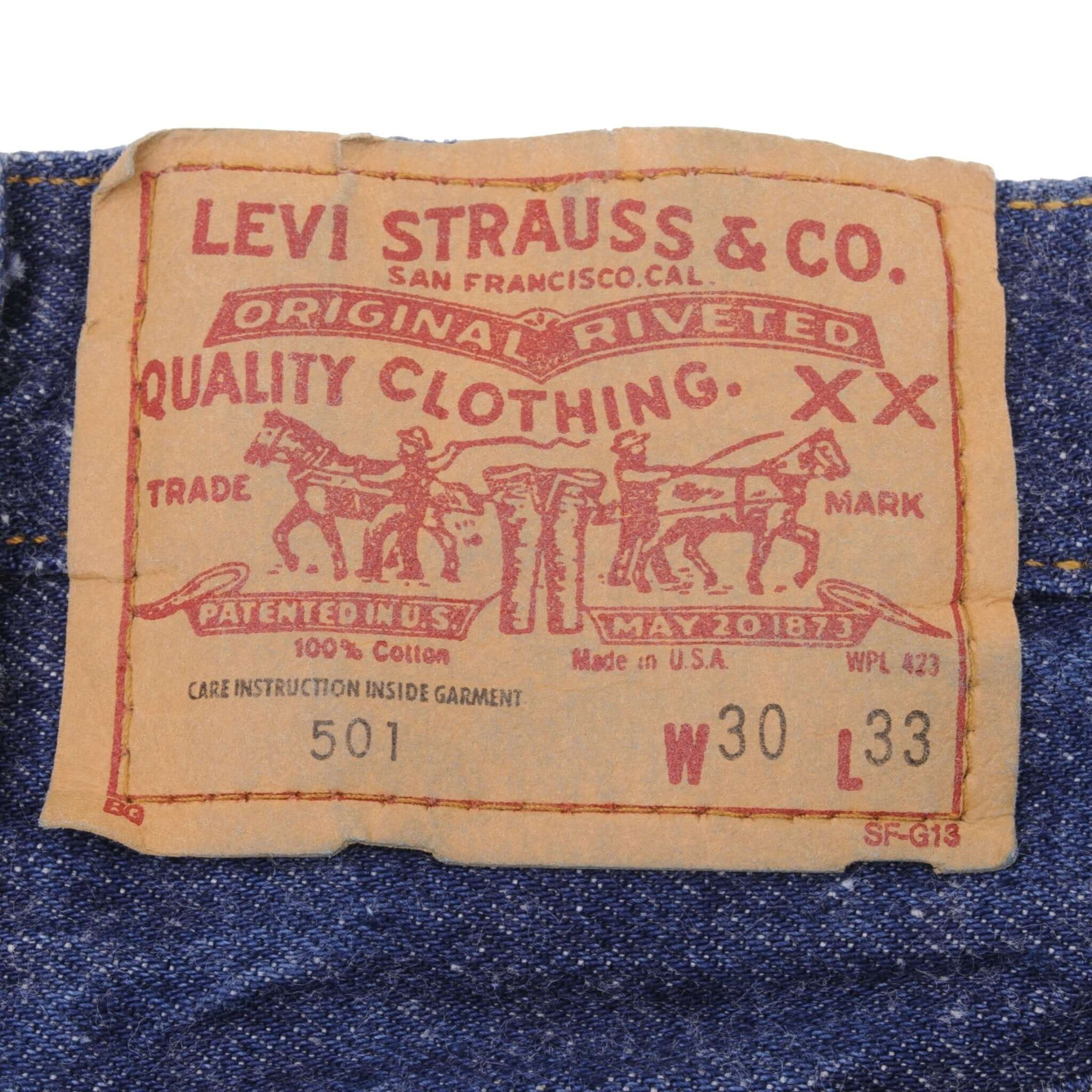 Beautiful Indigo Levis 501 Jeans 1980s Made in USA with Dark Wash Size on tag 30X33 Actual Size 29X30 Back Button #552
