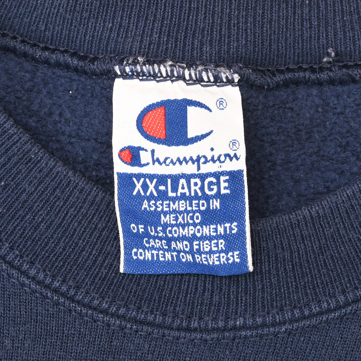 Champion XX-Large neck tag inside navy sweatshirt
