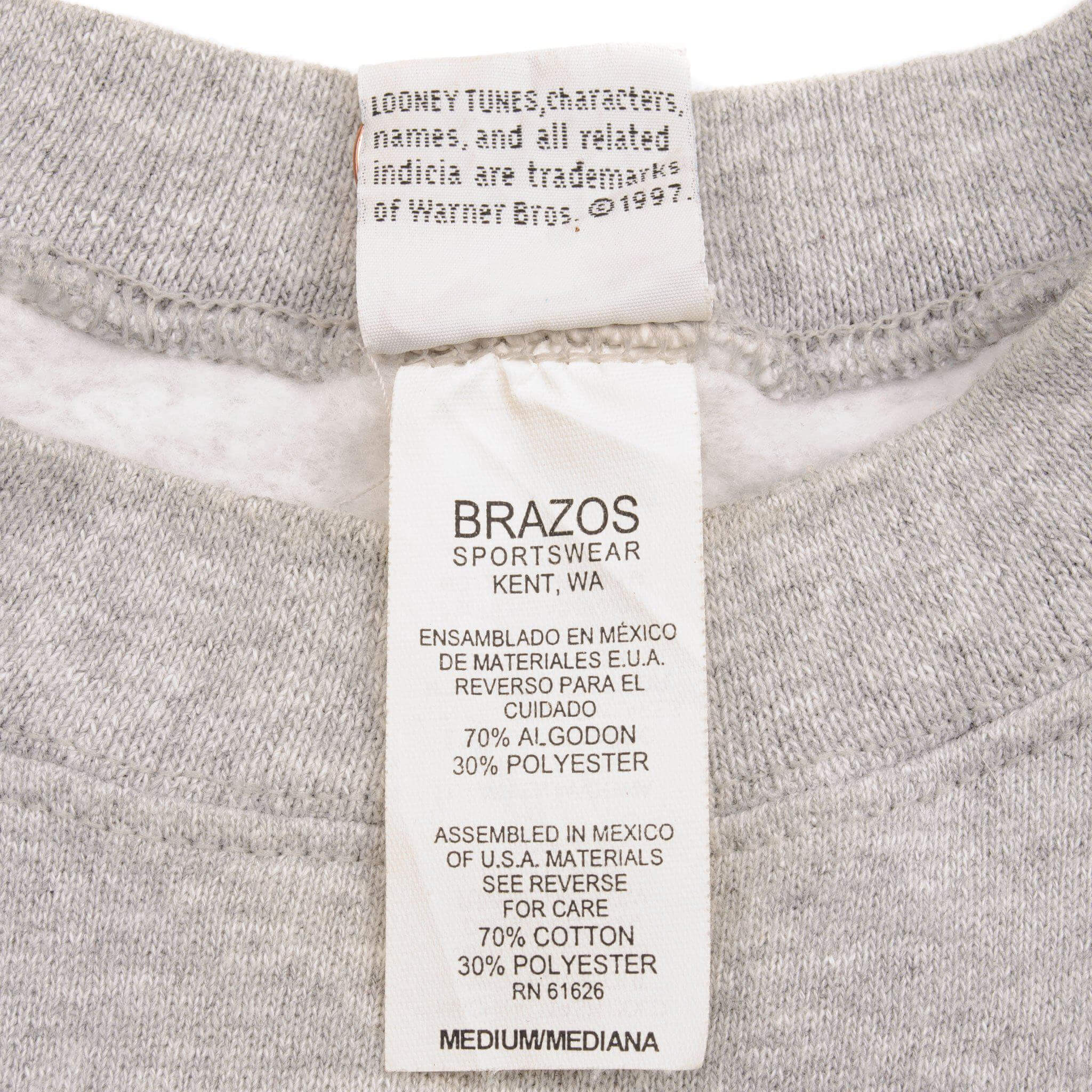 Vintage Looney TunVintage Looney Tunes sweatshirt TAZ on a bike 1997 90's size Large.es sweatshirt TAZ on a bike 90's size Large.