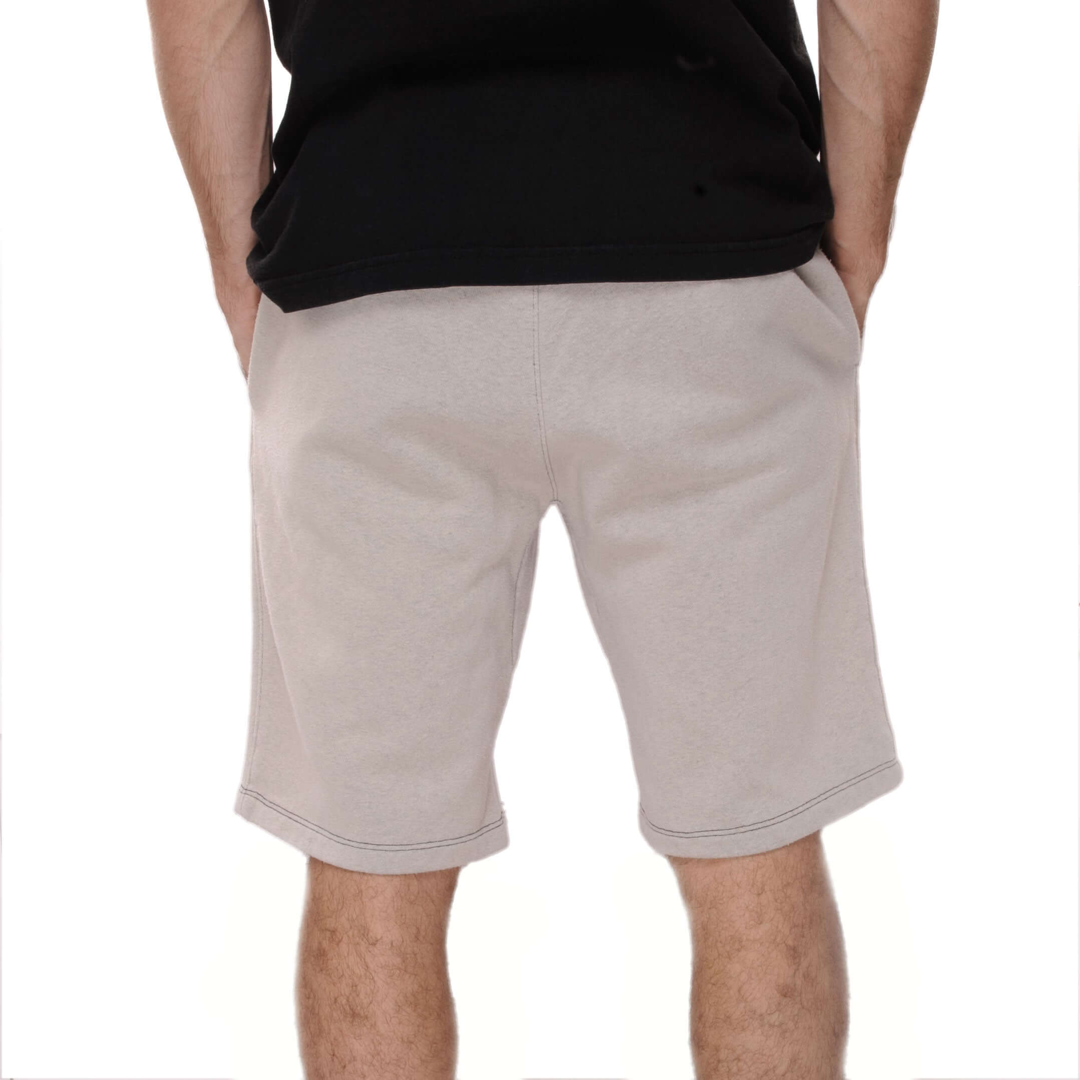 Vintage Nike Classic Swoosh Custom Made In The USA Beige Mid Length Shorts Available in Size Small, Medium, Large and XL. Up-cycled from Nike Joggers and Dye to a Pastel Beige color Sizing: The Model is 5'7 wearing a Size Medium