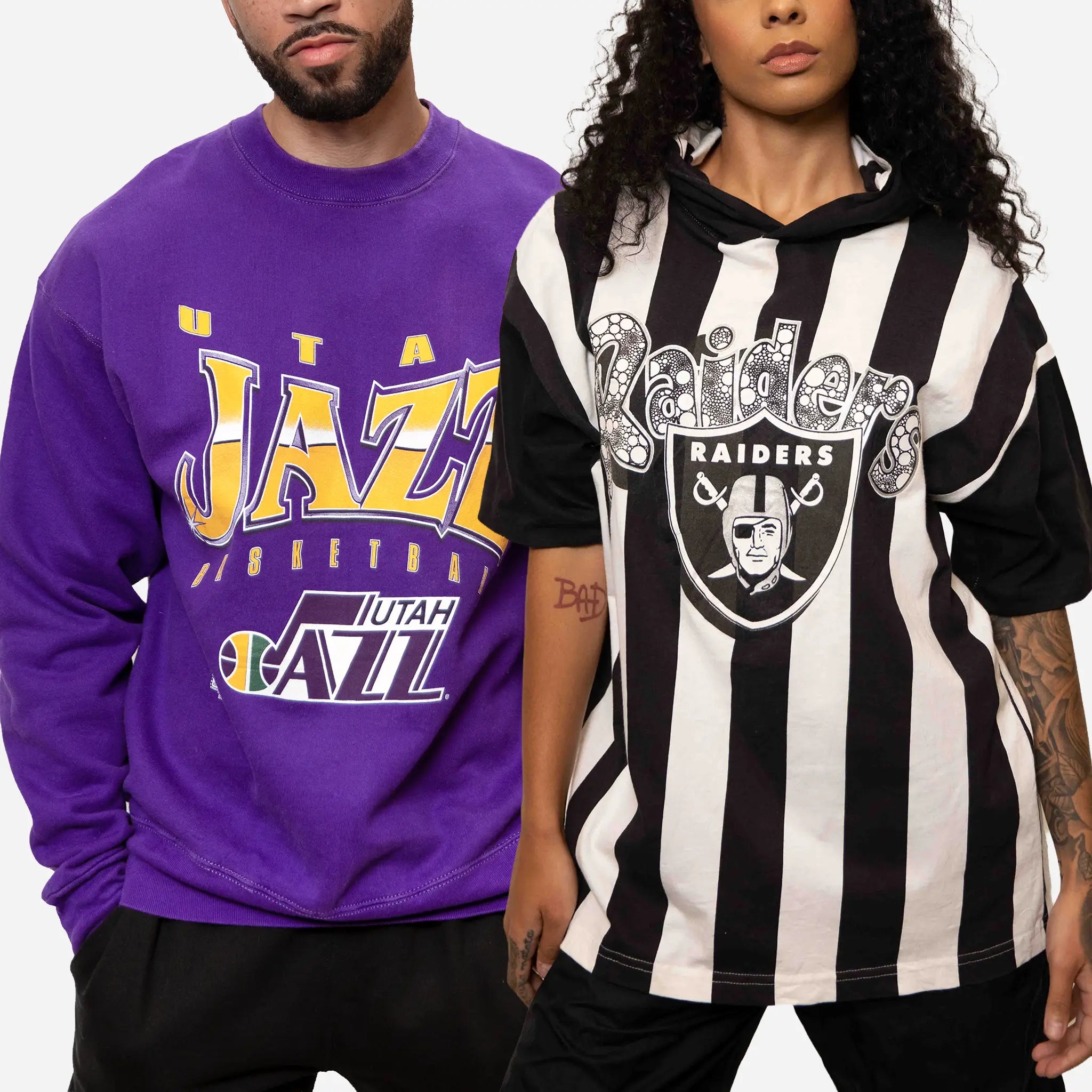 Vintage sports clothing including NBA, NFL, MLB, NHL and NCAA apparel