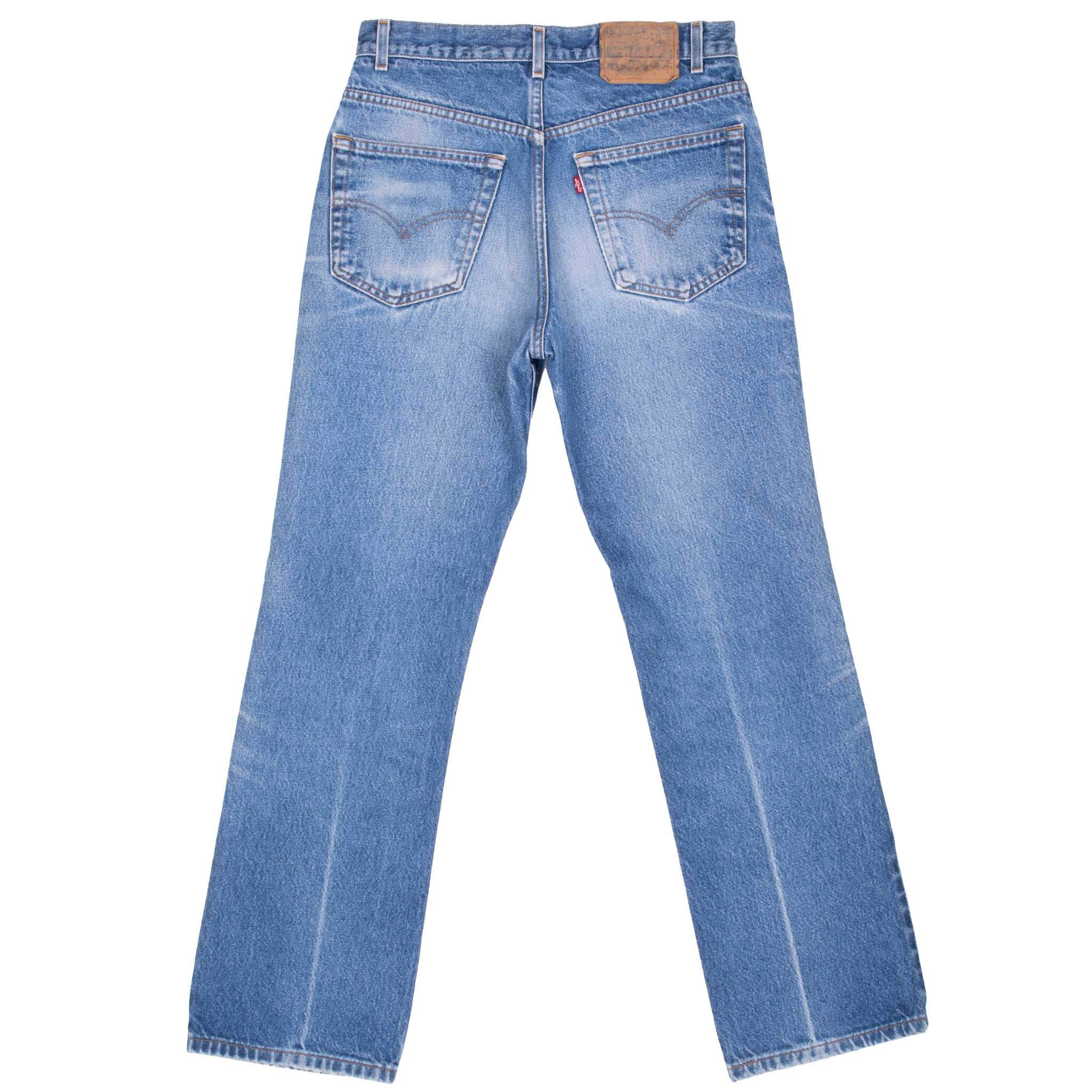 Beautiful Indigo Levis 517 Boot Cut Jeans 1980s with Medium Blue Wash With Beautiful Whiskers.
Size on tag 32X33 actual Size 31x31
Back Button #104