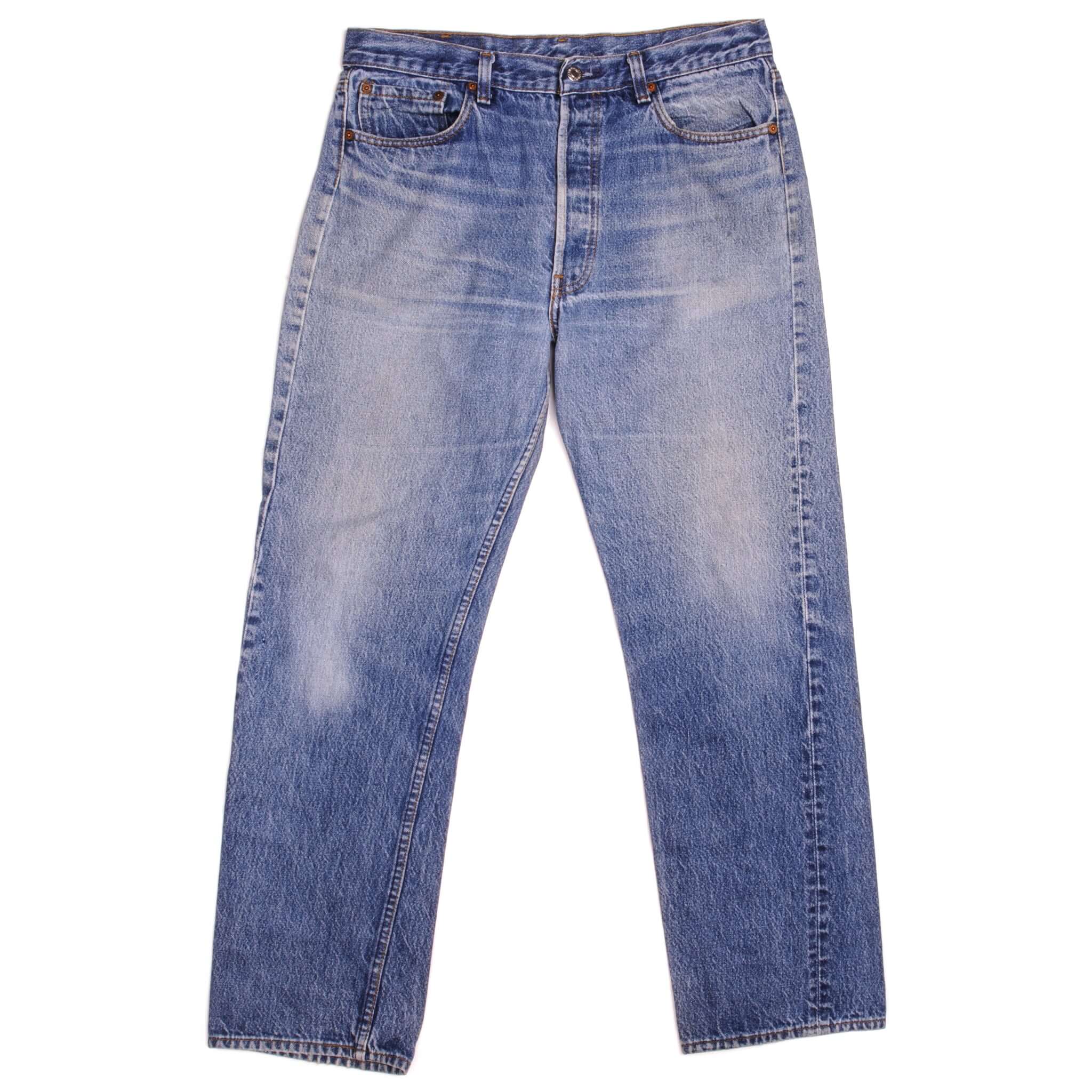 Beautiful Indigo Levis 501 Jeans Made in USA with a medium blue wash and a nice contrast of light and medium blue. Size on Tag 36X34 ACTUAL SIZE 32X30 Back Button #524