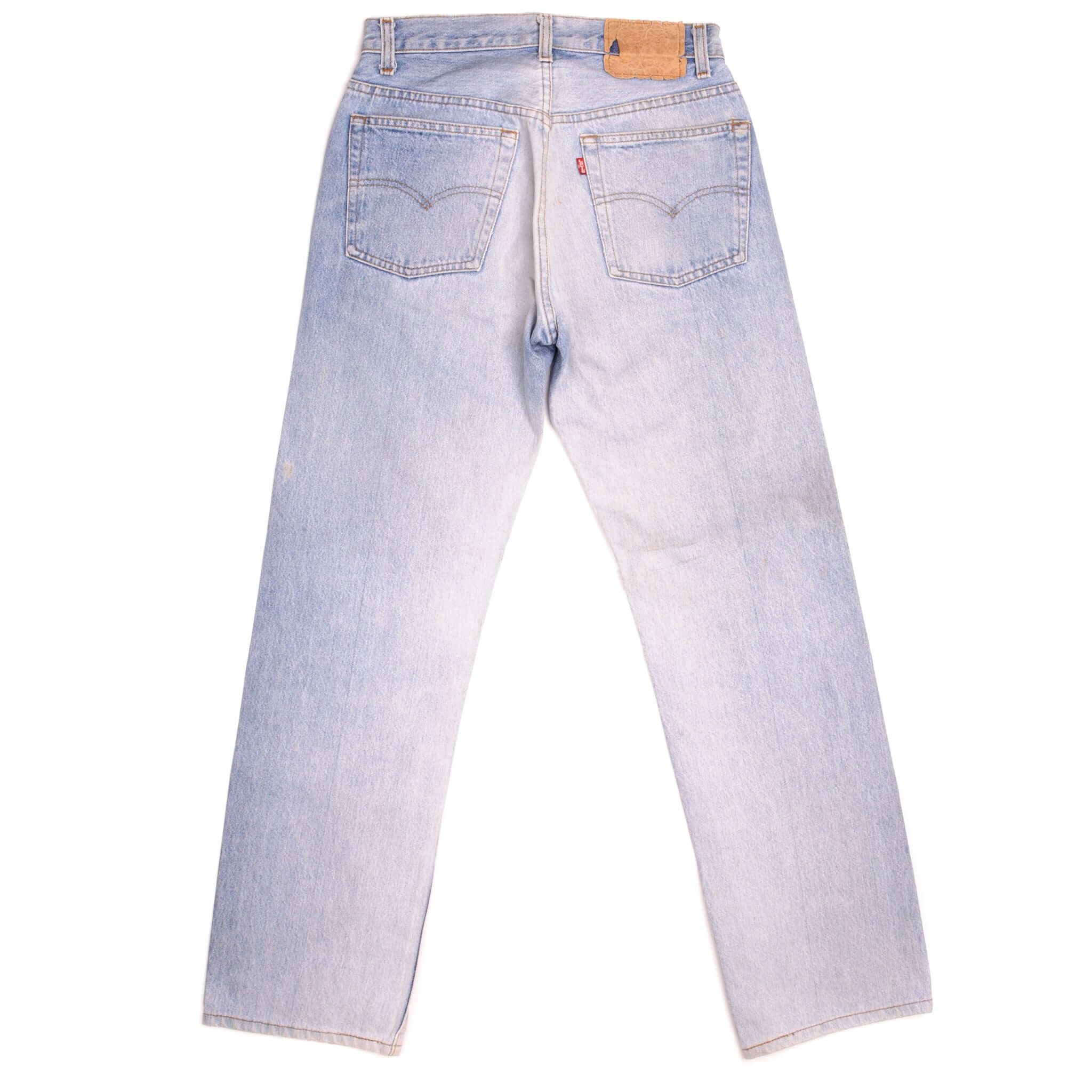 Beautiful Indigo Levis 501 Jeans Made in USA with a light blue wash and a nice contrast of light blue and very light blue. Size on Tag 28X36 ACTUAL SIZE 27X29 Back Button #555