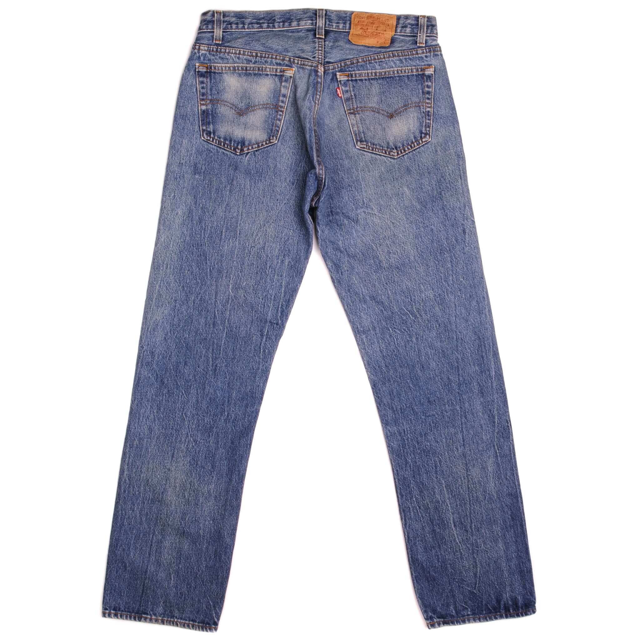 Beautiful Indigo Levis 501 Jeans 1988-1993 Made in USA with a medium blue wash, a nice contrast of light and medium blue and some light whiskers. Size on Tag 34X32 ACTUAL SIZE 33X30 Back Button #501