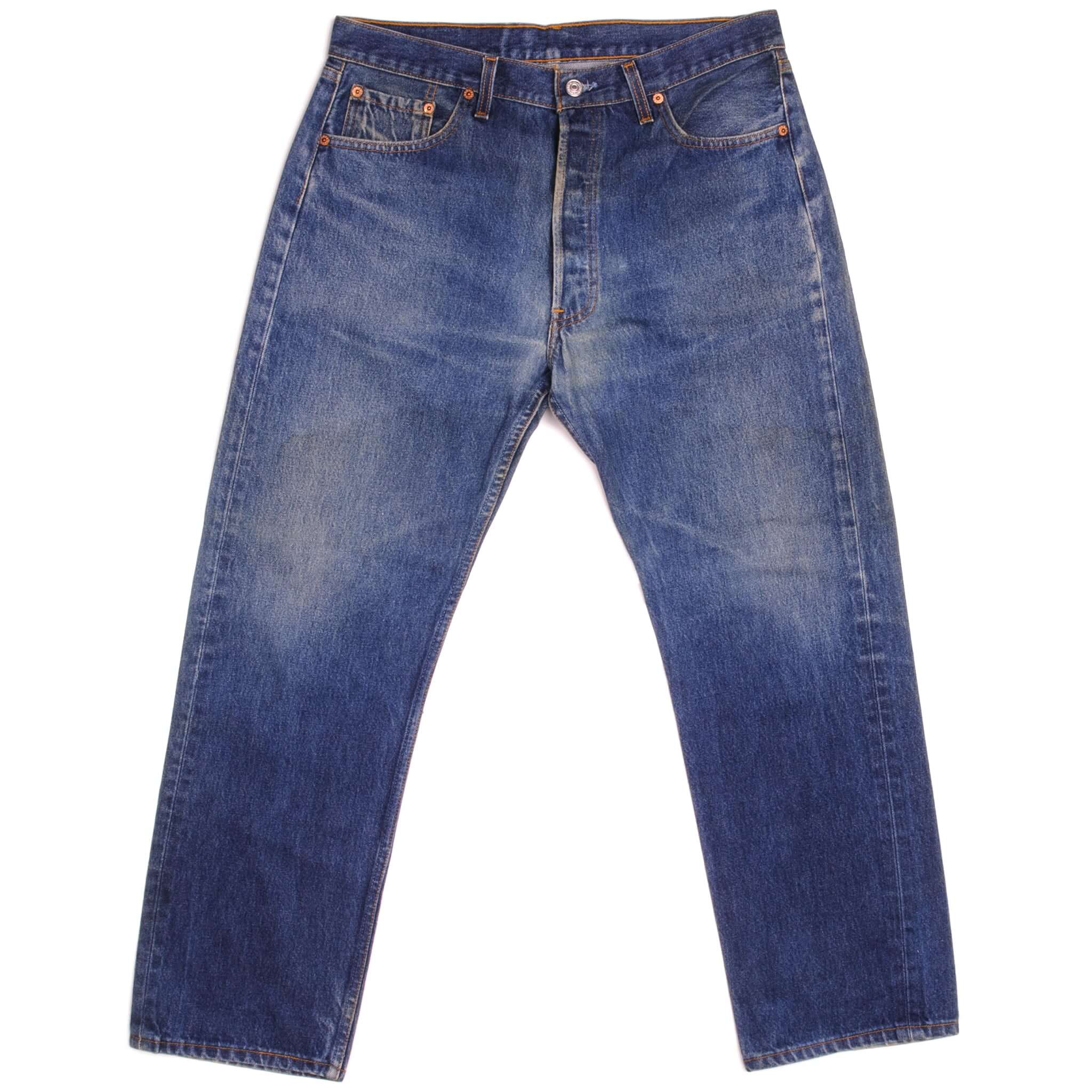 Beautiful Indigo Levis 501 Jeans 1990s Made in USA with a dark blue wash, a nice contrast of medium and dark blue and some light whiskers. Size on Tag 36X32 ACTUAL SIZE 35X29 Back Button #524