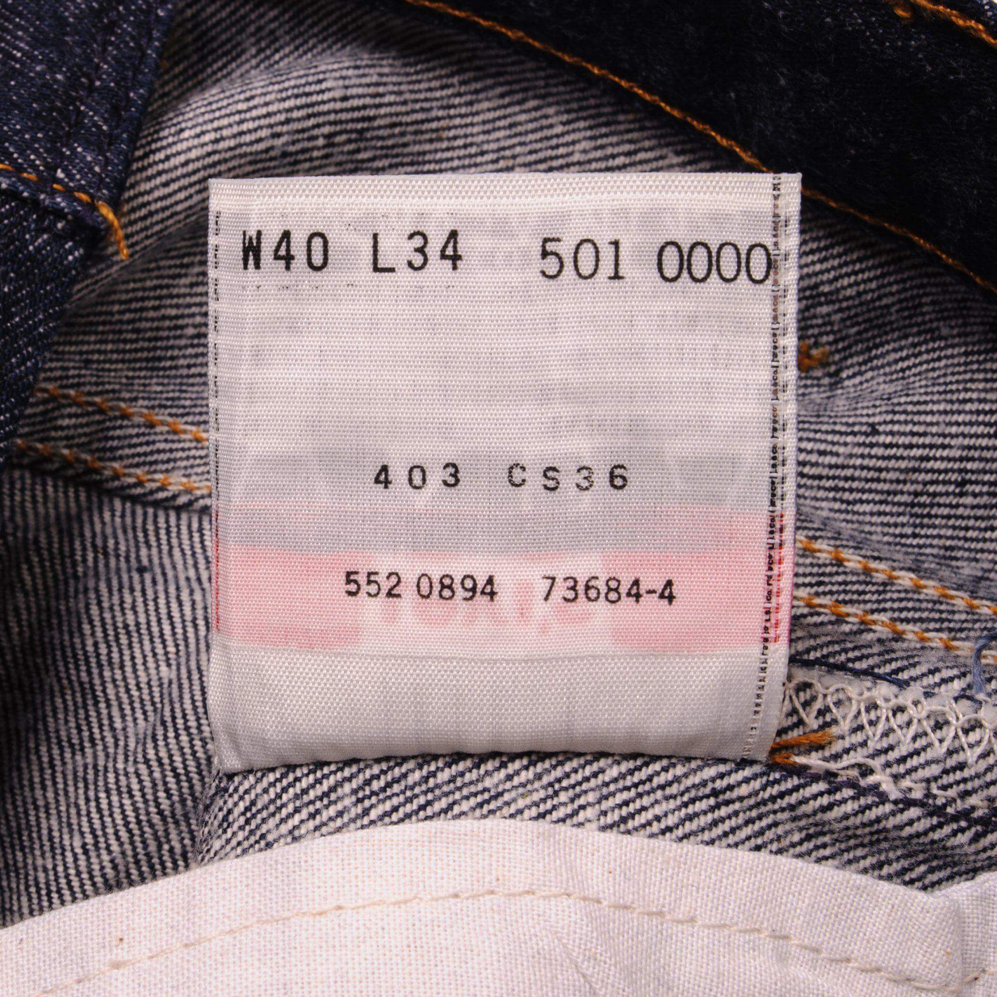 Beautiful Indigo Levis 501 Jeans 1990s Made in USA with a very dark wash. Size on Tag 40X34 ACTUAL SIZE 38X32 Back Button #552