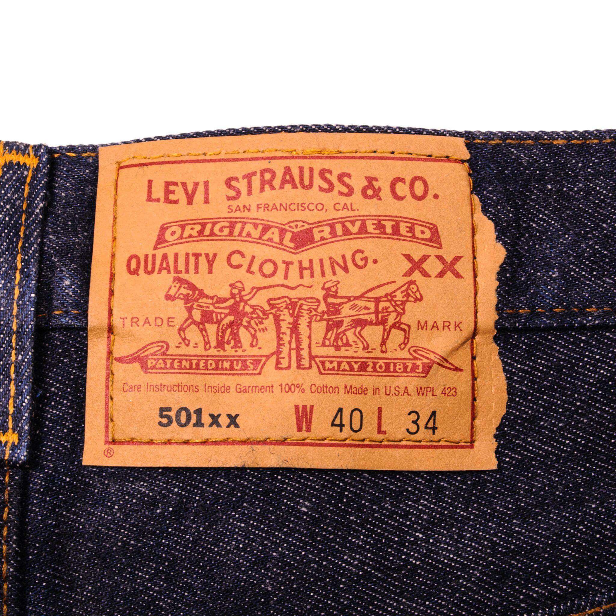 Beautiful Indigo Levis 501 Jeans 1990s Made in USA with a very dark wash. Size on Tag 40X34 ACTUAL SIZE 38X32 Back Button #552
