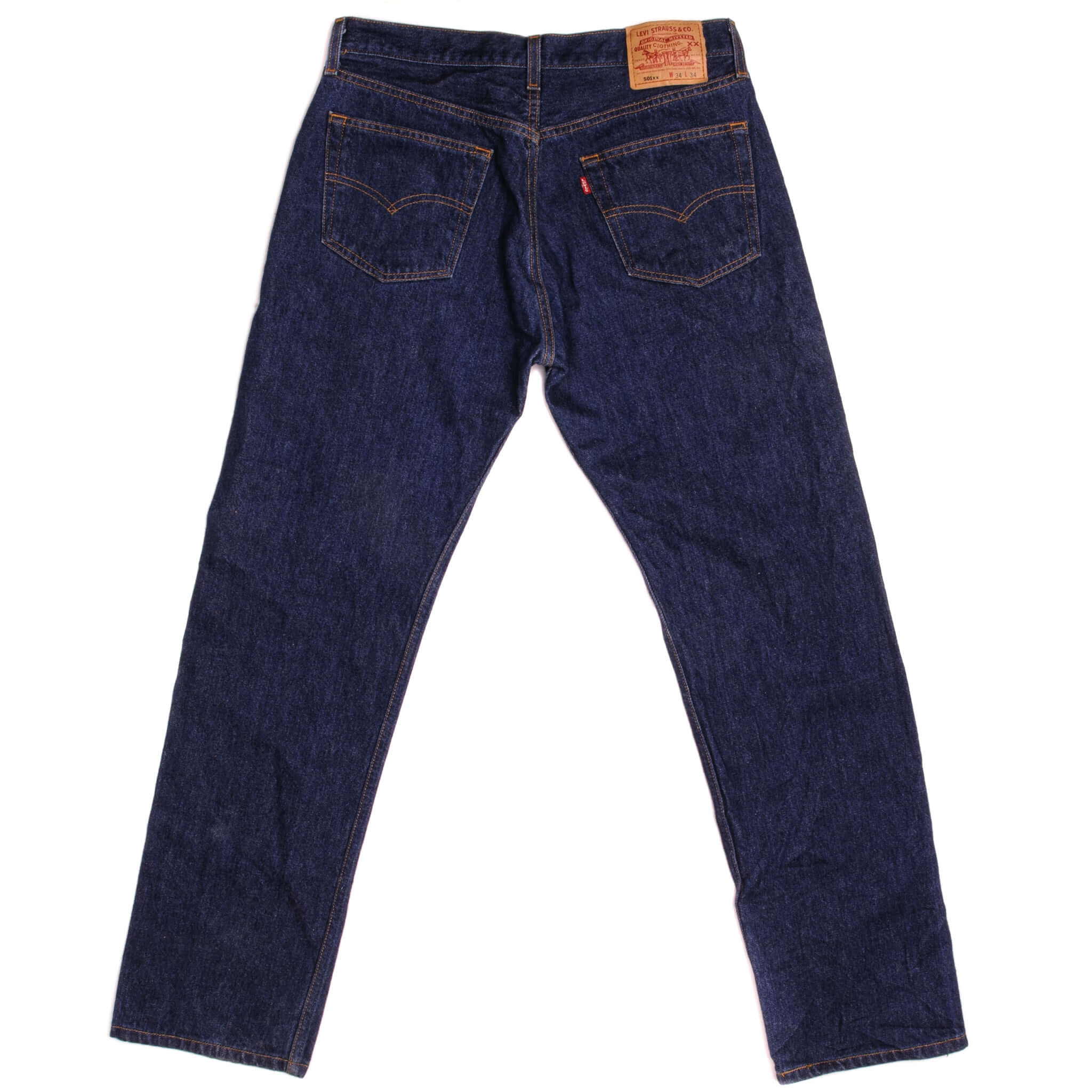 Beautiful Indigo Levis 501 Jeans Made in USA with a very dark wash. Size on Tag 34X34 ACTUAL SIZE 33X31 Back Button #555