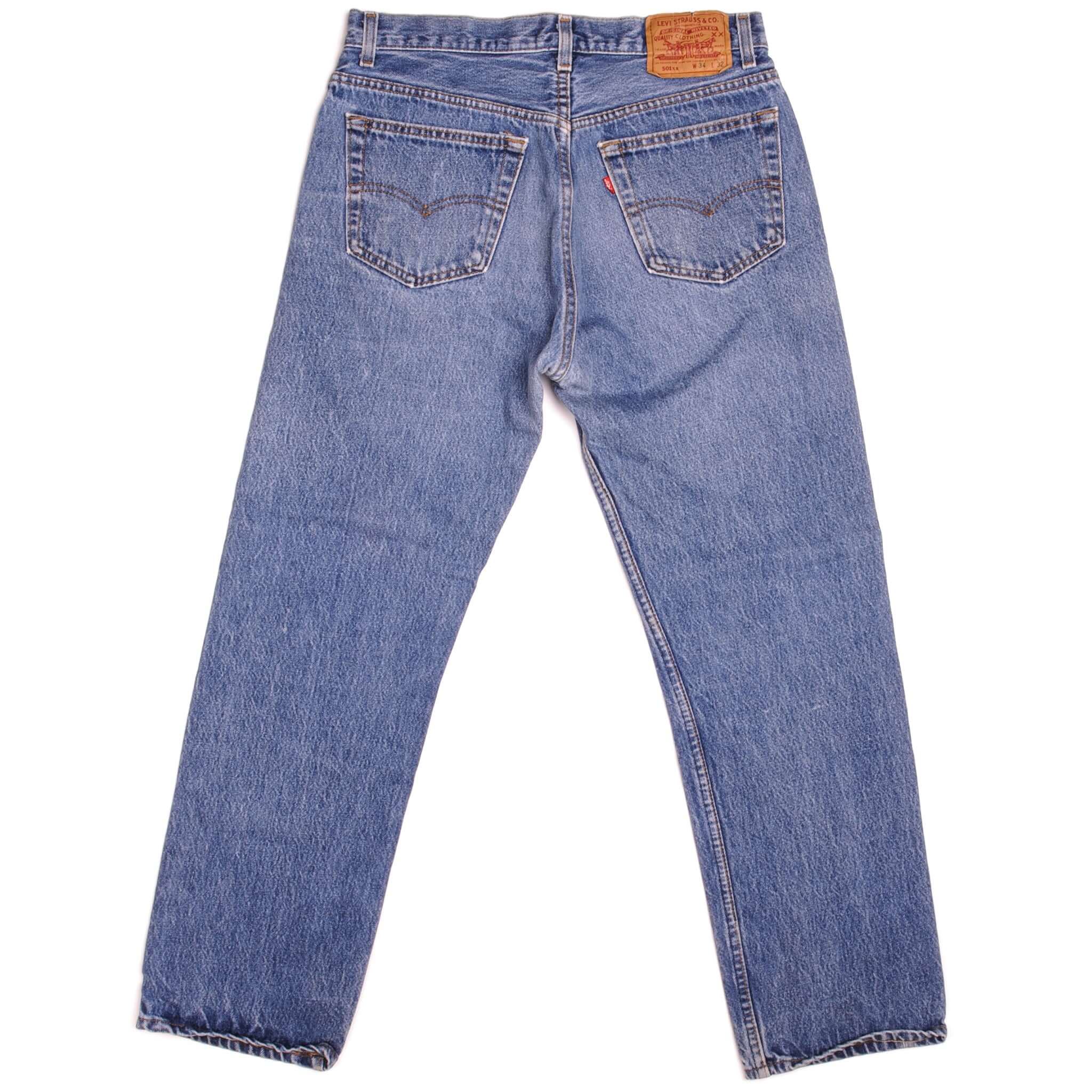 Beautiful Indigo Levis 501 Jeans Made in USA with a medium blue wash, some nice contrast between light and medium blue and some light whiskers. Size on Tag 34X32 ACTUAL SIZE 32X28 Back Button #546