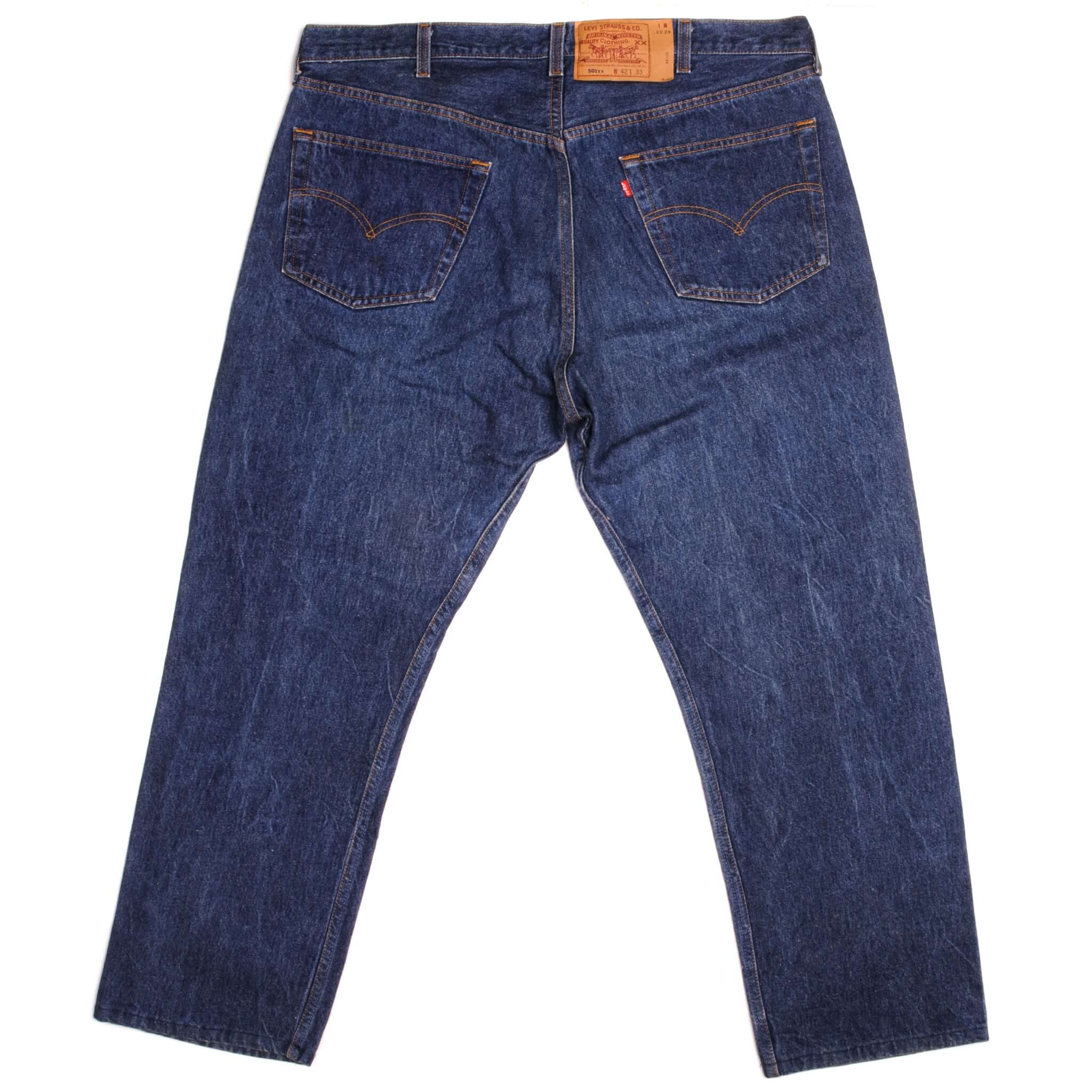 Beautiful Indigo Levis 501 Jeans 1990's Made in USA with a dark blue wash, some nice contrast between light and dark blue. Size on Tag 42X33 ACTUAL SIZE 41X29 Back Button #552