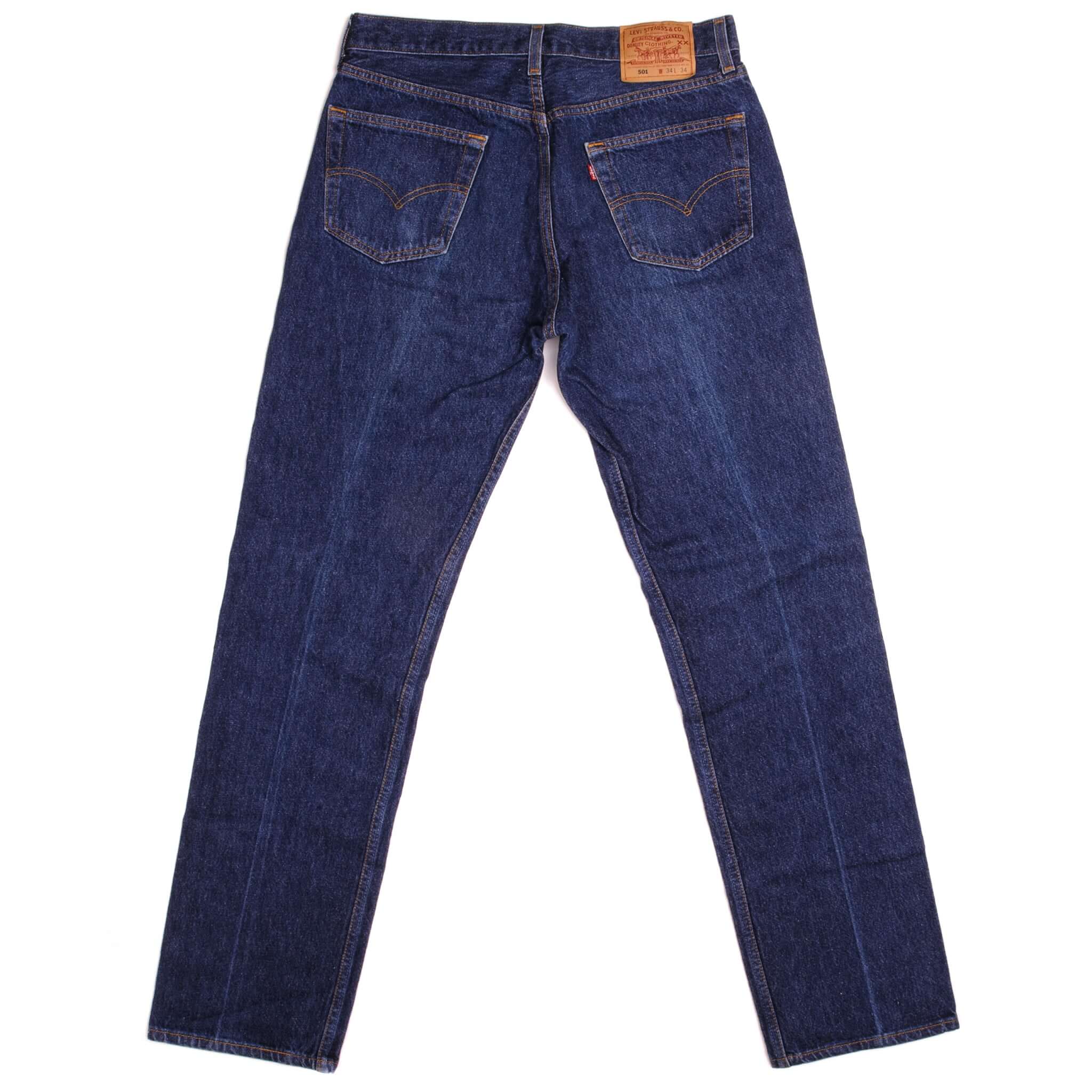 Beautiful Indigo Levis 501 Jeans 1990's Made in USA with a very dark wash. Size on Tag 34X34 ACTUAL SIZE 33X33 Back Button #511