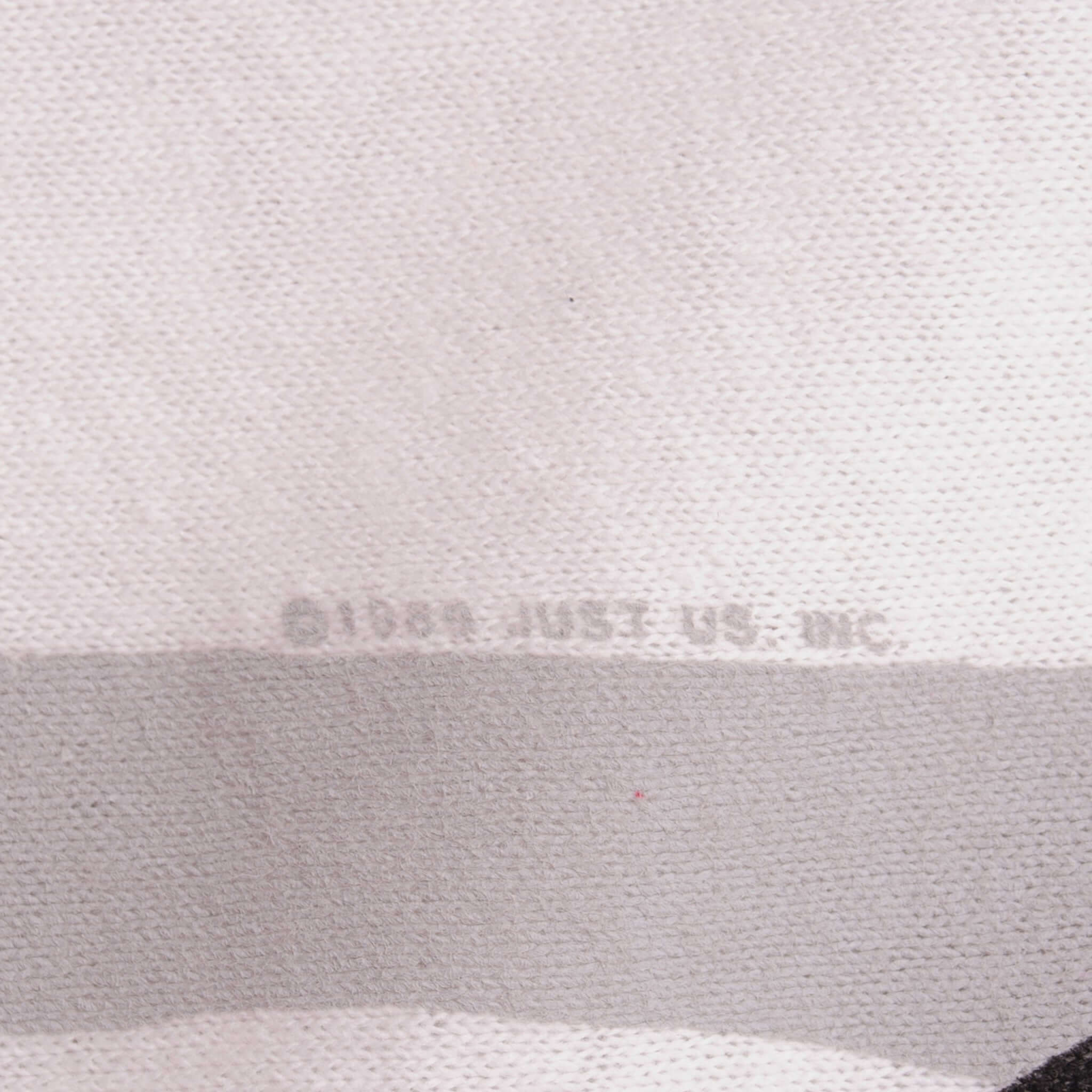 Vintage New Edition Heatwave 1989 With Ronnie DeVoe, Bobby Brown, Ricky Bell, and Michael Bivins Tee Shirt Size Medium Made In USA With Single Stitch Sleeves.