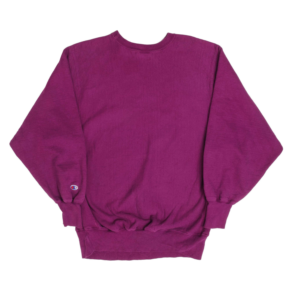 Back of fuchsia Champion Reverse Weave crewneck sweatshirt with embroidered sleeve logo