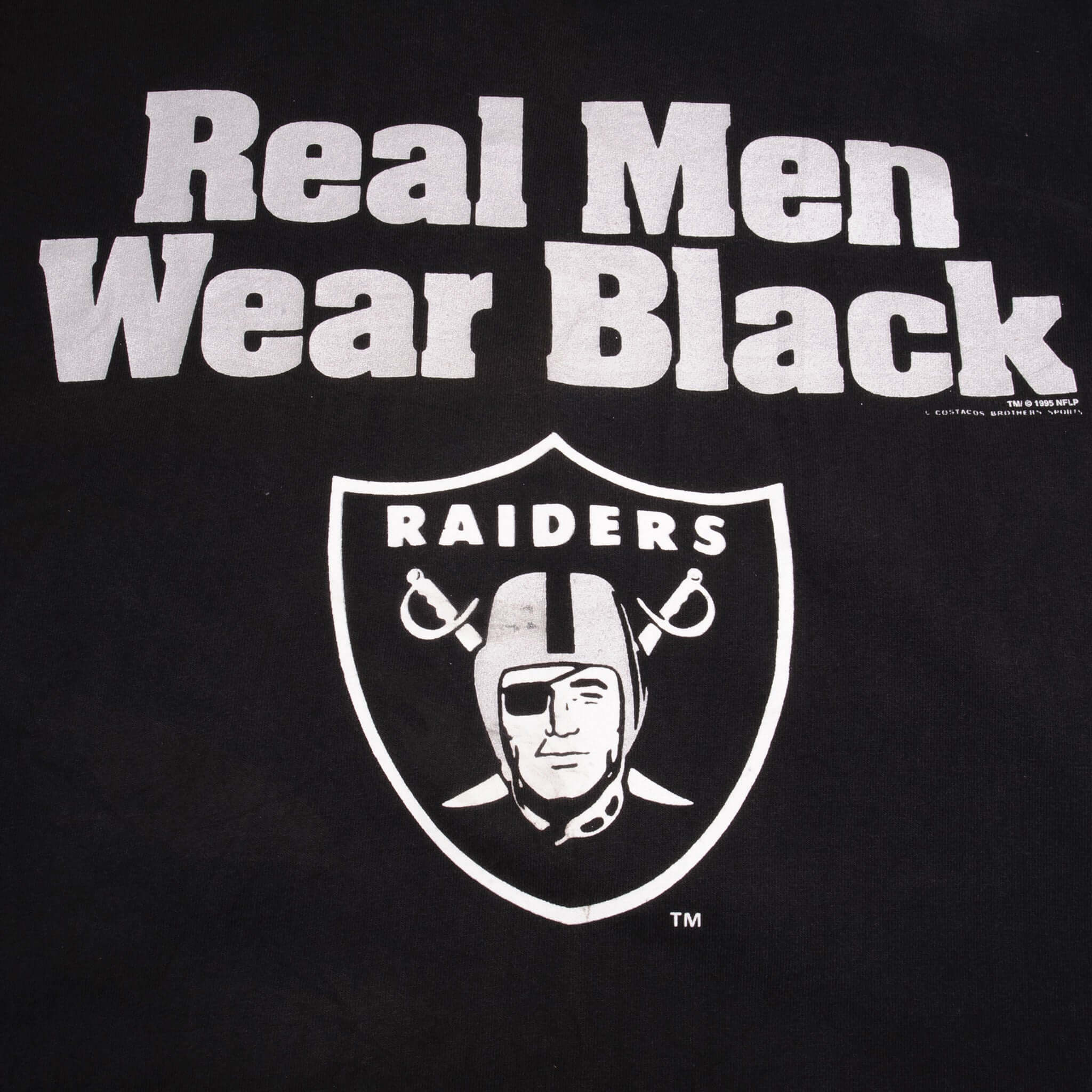 Vintage NFL Los Angeles Raiders Real Men Wear Black Tee Shirt 1995 Size Medium Made In USA With Single Stitch Sleeves