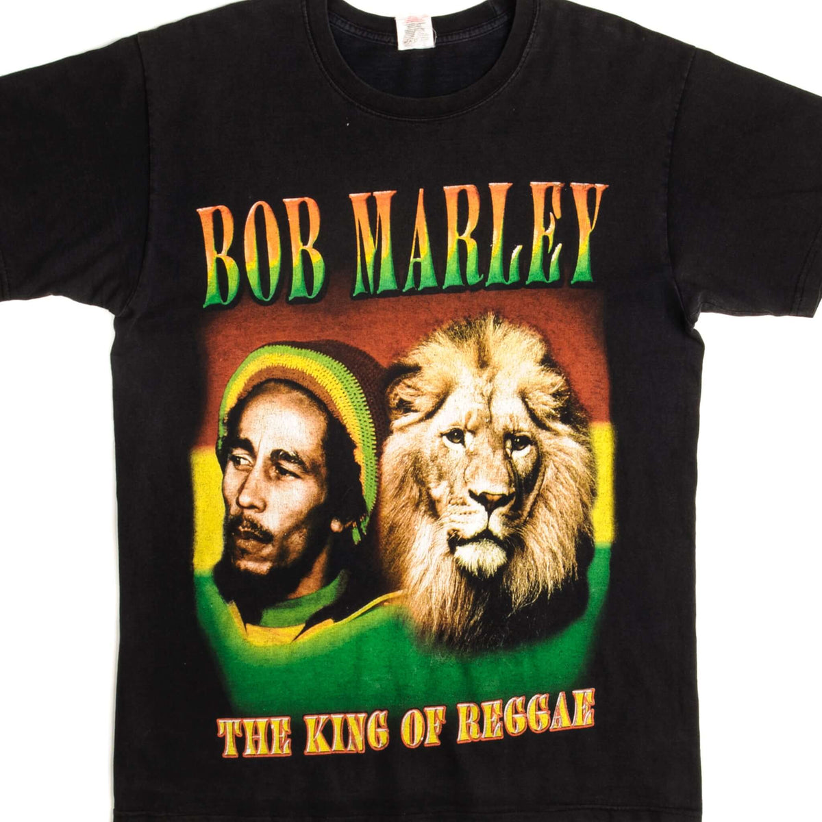 Front close-up of black Bob Marley T-shirt with portrait and lion graphic