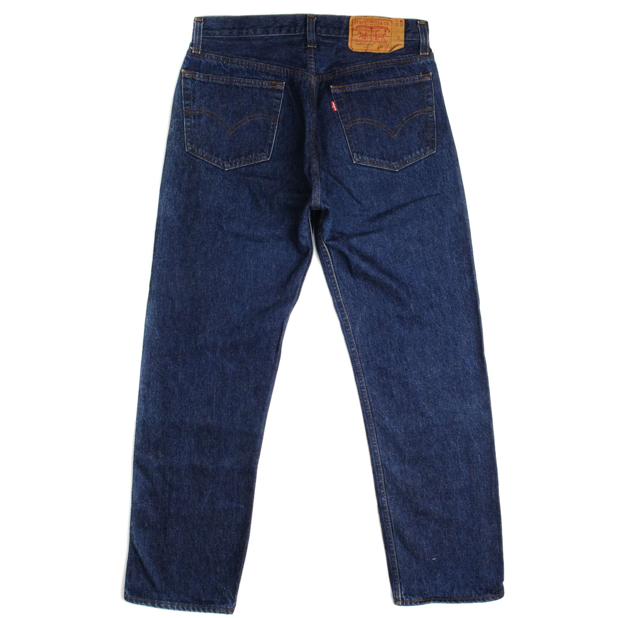 Beautiful Indigo Levis 501 Jeans Made in USA with a very dark blue wash. Size 32x29 Back Button #520