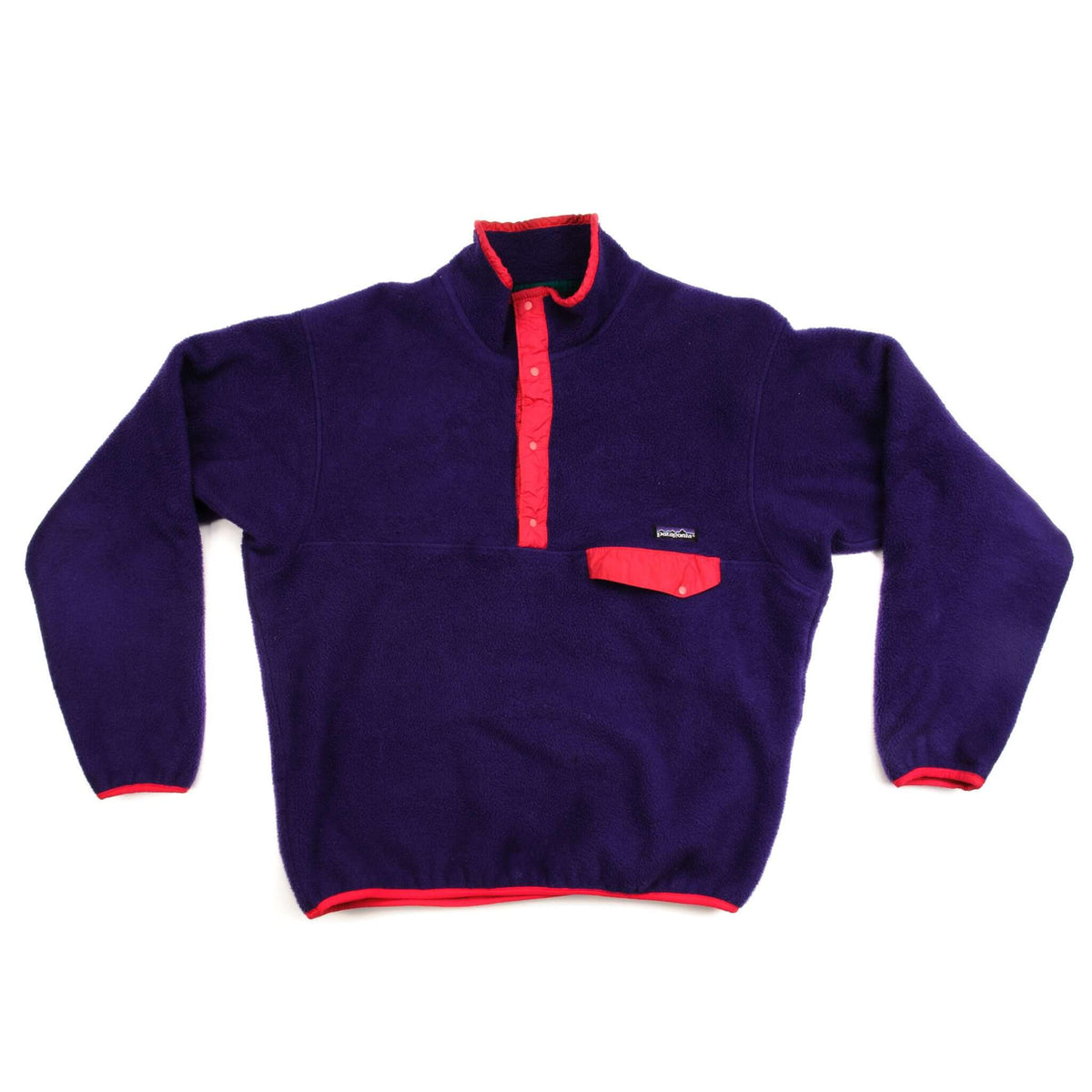 Front of purple Patagonia Snap-T fleece pullover with contrasting red trim