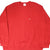 Front of red Nike crewneck sweatshirt with small white embroidered Swoosh on chest