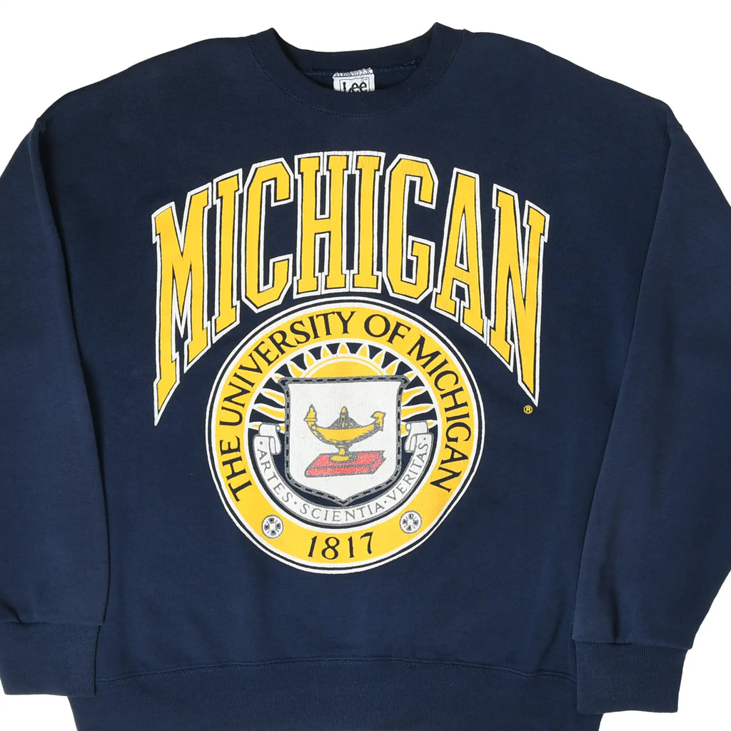 Front of navy University of Michigan sweatshirt with maize lettering and seal graphic