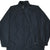 Front of black Nike windbreaker jacket with full zip, zippered pockets, and white Swoosh