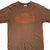 Front of brown Harley-Davidson T-shirt with orange Motor Cycles logo
