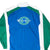 Back detail of blue, green and white Champion windbreaker with large embroidered logo