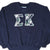 Front close-up of navy Russell Athletic sweatshirt with plaid Epsilon Kappa letters