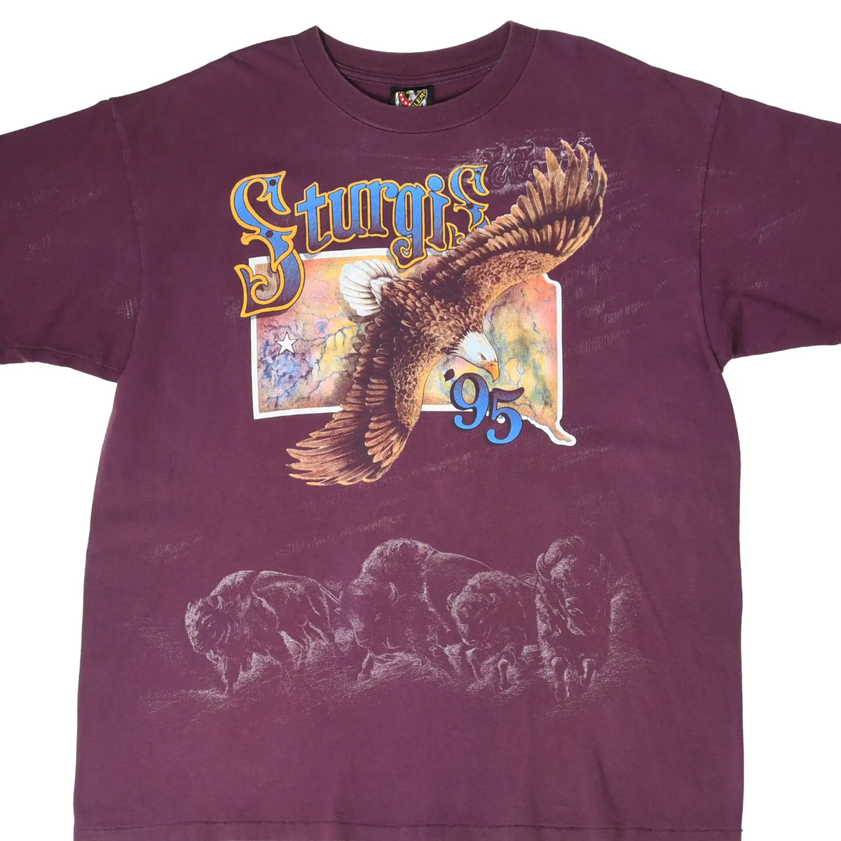 Front of burgundy Sturgis '95 T-shirt with eagle graphic and faded buffalo print