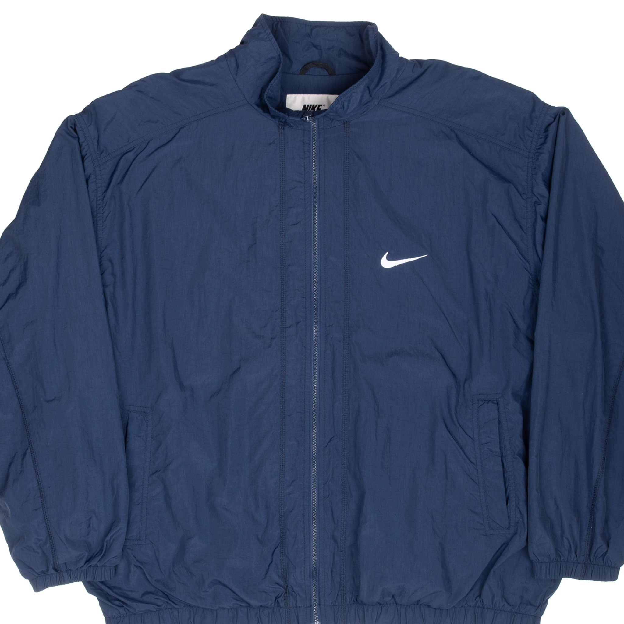 VINTAGE NIKE CLASSIC SWOOSH BLUE WINDBREAKER JACKET 1990S 2XL