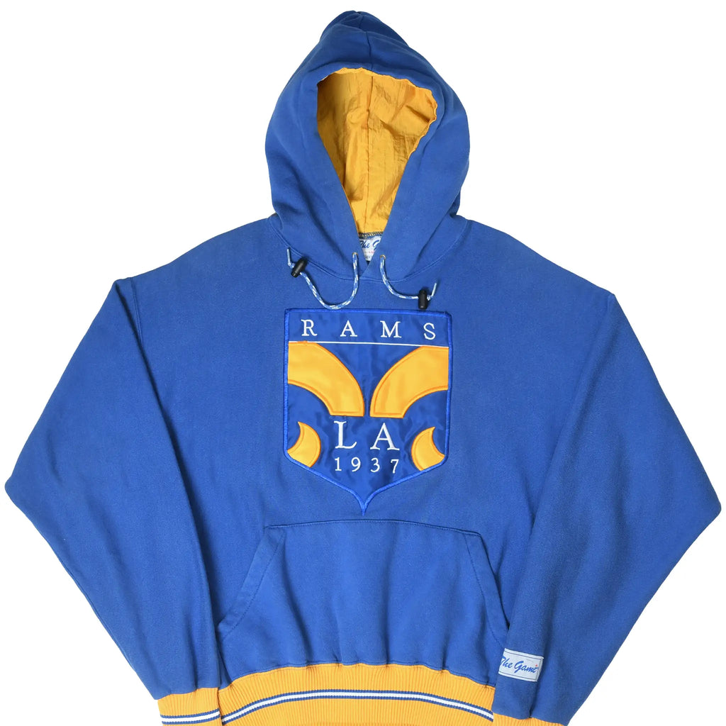 Front view of blue Los Angeles Rams hoodie with gold-lined hood, chest crest, and striped hem