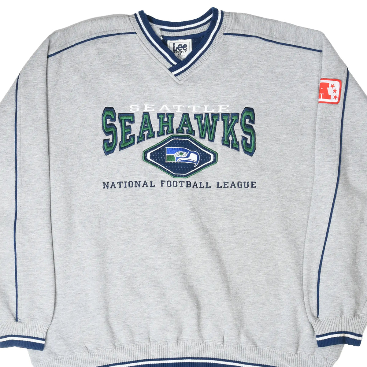 Front of gray Seattle Seahawks sweatshirt with embroidered team logo and navy piping
