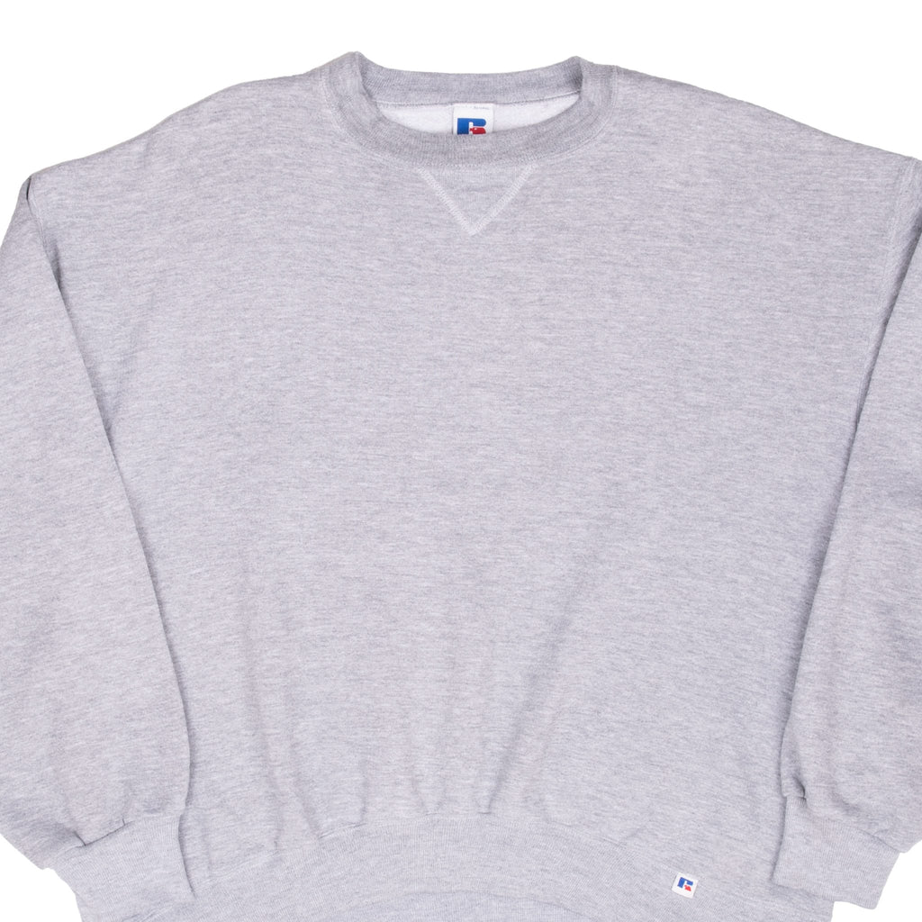 Close front view of a blank gray Russell Athletic crewneck sweatshirt with ribbed trim