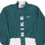 VINTAGE NIKE SPELLOUT SWOOSH GREEN WINDBREAKER JACKET 1990S LARGE