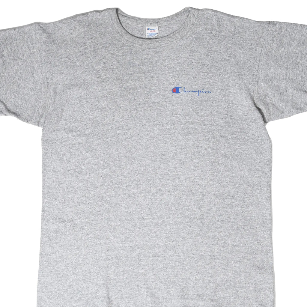 Cropped front view of a heather gray Champion T-shirt with a small blue and red chest logo