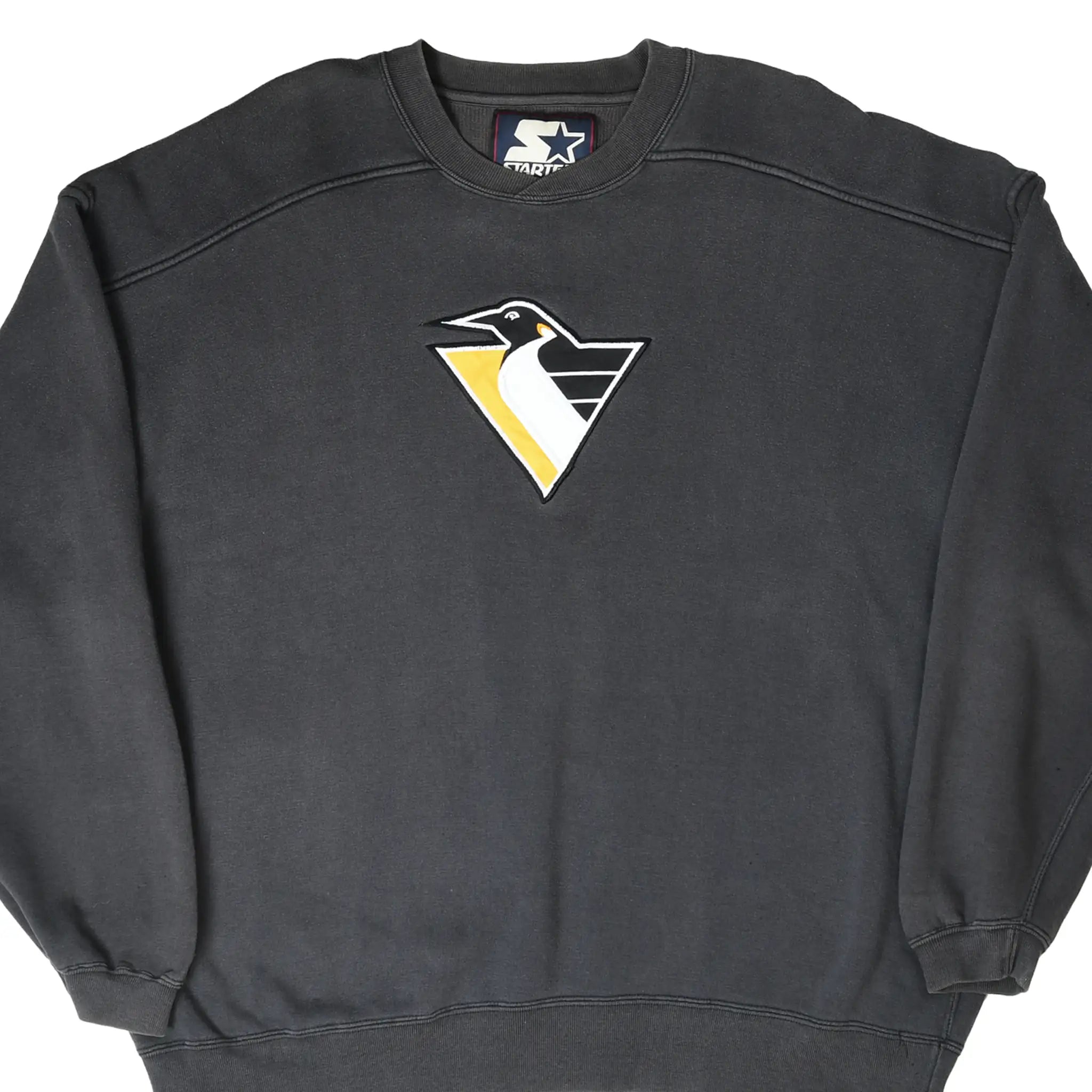 Front of black Starter sweatshirt with embroidered Pittsburgh Penguins logo