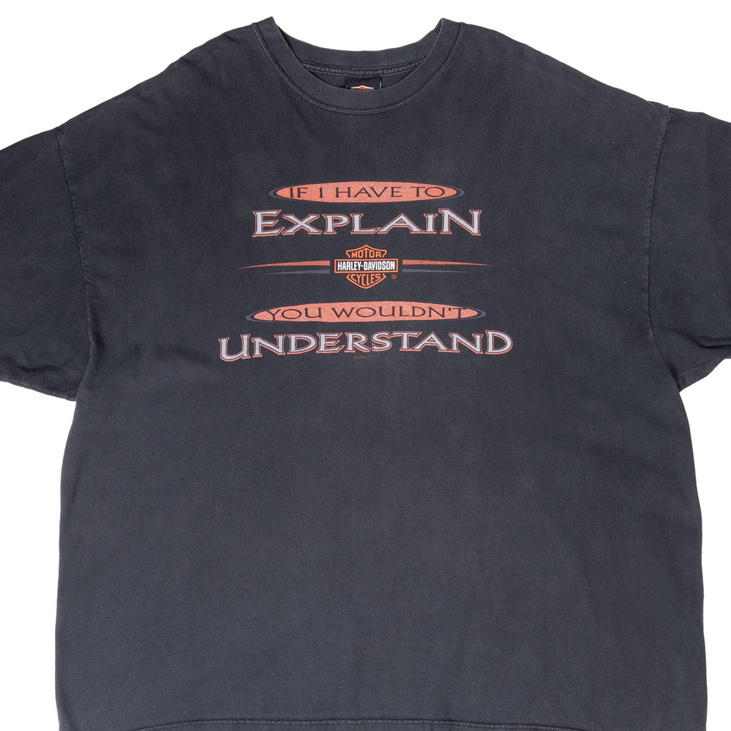 Front upper view of black Harley-Davidson T-shirt with orange, gray and white slogan graphic