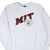 Front of grey Champion crewneck sweatshirt with red and black MIT lettering and university seal