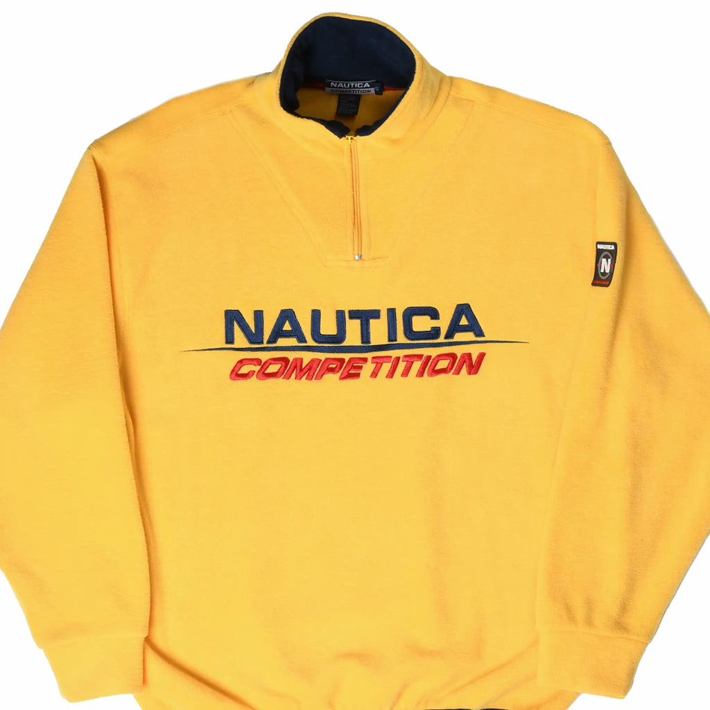Front of yellow Nautica Competition quarter-zip fleece with navy and red embroidered logo