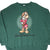 Front of green Disney sweatshirt with Grumpy character and Walt Disney World graphic