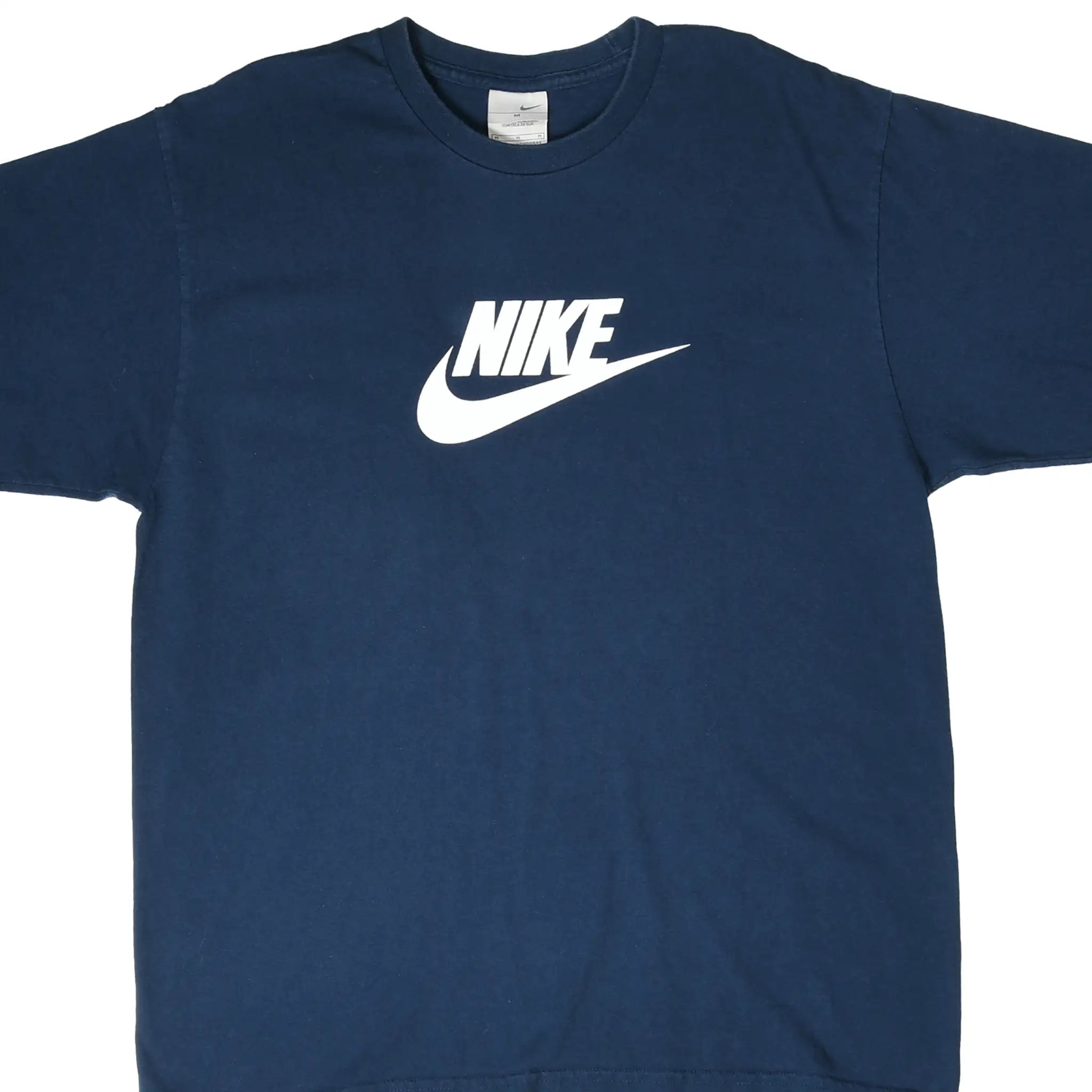 Front of navy blue Nike T-shirt with white spellout and Swoosh graphic