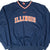 Front of navy Nike Illinois pullover jacket with orange Swoosh and arched lettering