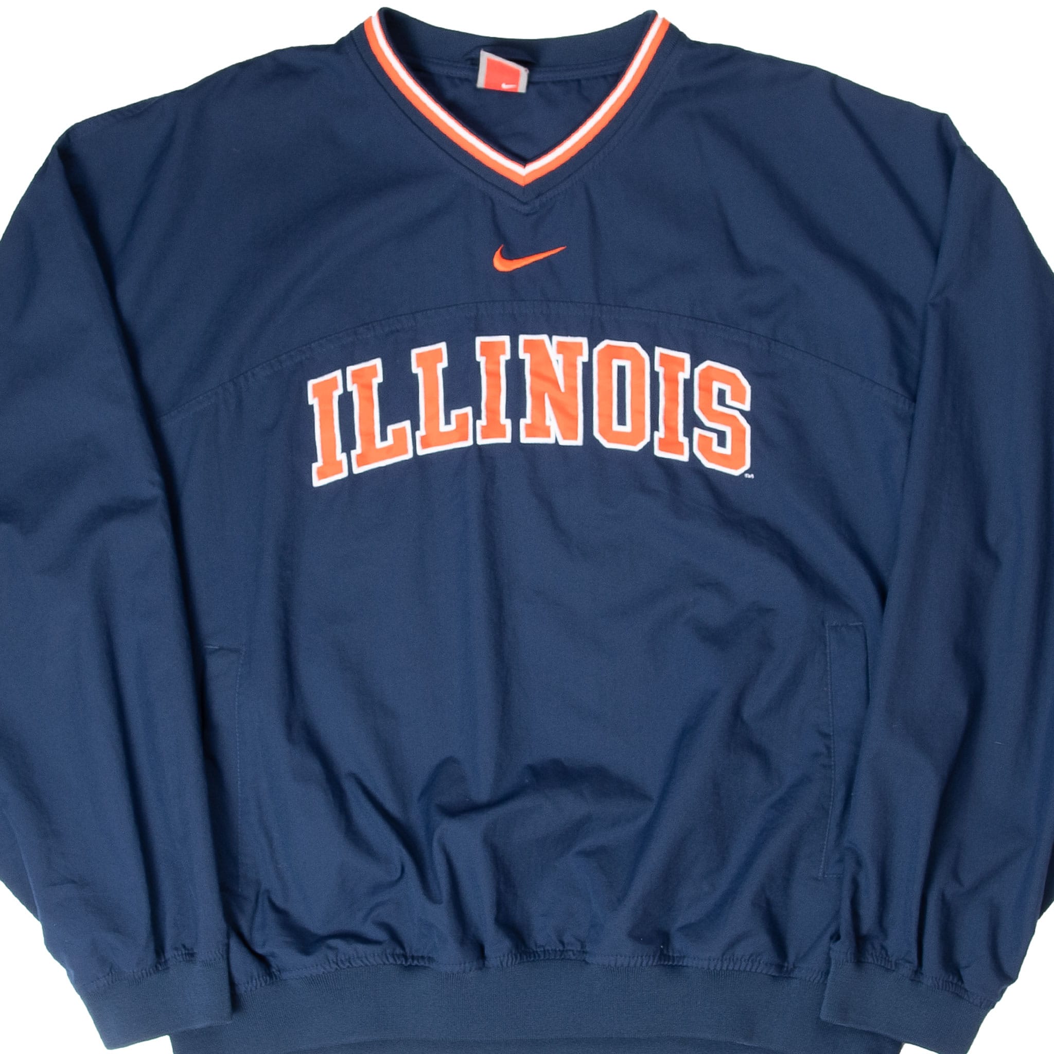 Front of navy Nike Illinois pullover jacket with orange Swoosh and arched lettering