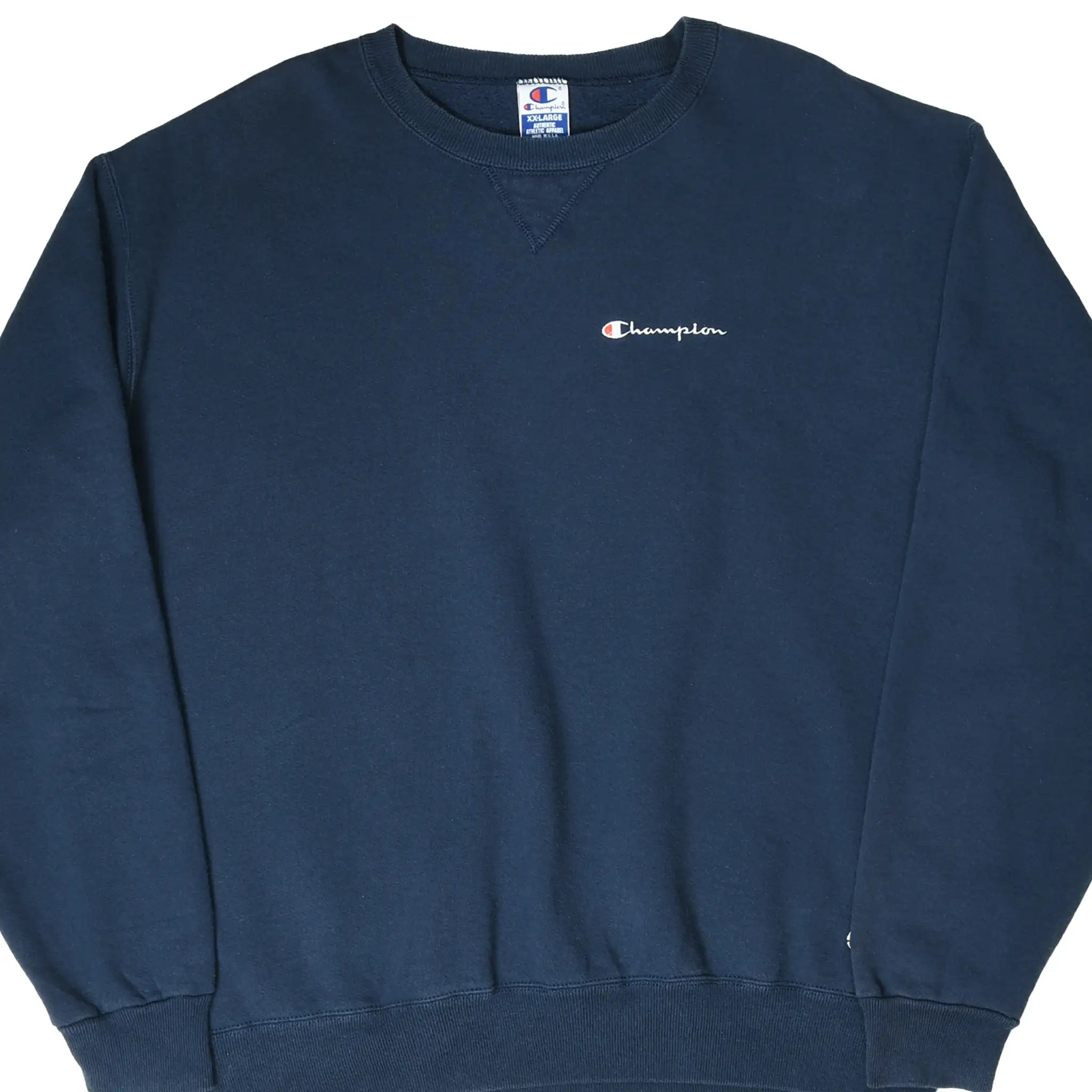 Front of navy blue Champion crewneck sweatshirt with small embroidered chest logo