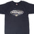 Upper front of black Harley-Davidson T-shirt with oval flame graphic and Bar & Shield logo
