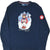 Front of navy Ralph Lauren long-sleeve shirt with skiing Polo Bear graphic and Team USA sleeve patch