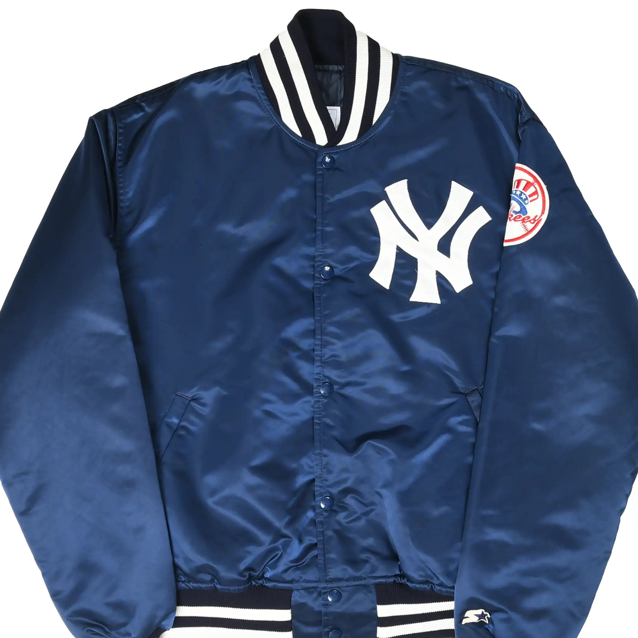 Front of navy Starter New York Yankees satin bomber jacket with white NY logo