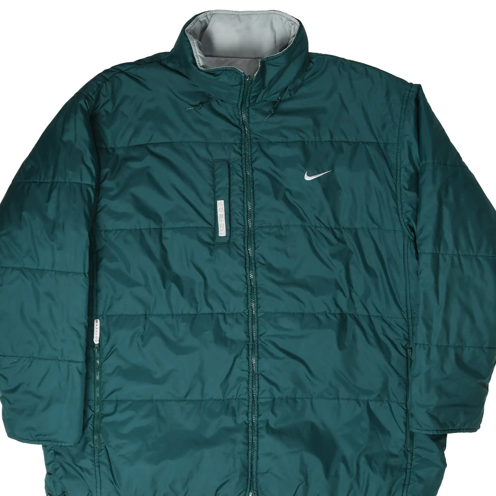 Front of dark green Nike reversible windbreaker with white chest Swoosh and zip pockets